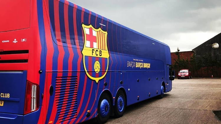 Covering the entire team bus including the windows, the vehicle wrap - featuring FC Barcelona's colours and crest - was printed by Astra Signs onto an innovative PVC material from Drytac's Polar range.