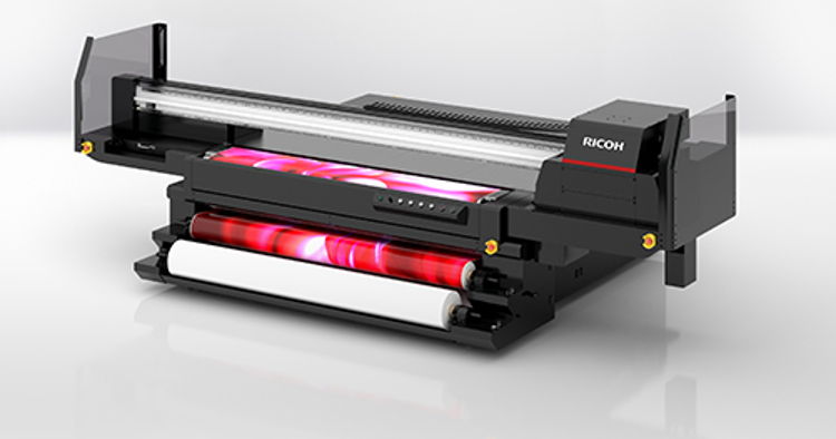 The Ricoh Pro TF6251 hybrid flatbed UV printer flexibly handles roll fed media and rigid media.