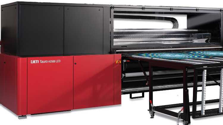 The Jeti Tauro LED is a 100 inch (2.5m) -wide hybrid UV-inkjet printer with an integrated roll-to-roll system that is built for demanding 24/7 workloads.