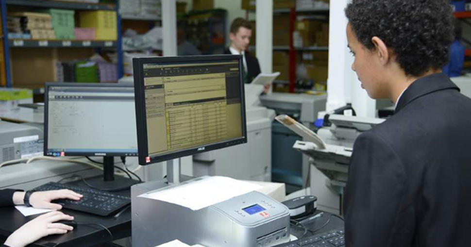 Business-education enterprise uses commercial print operation to improve life skills for school children.